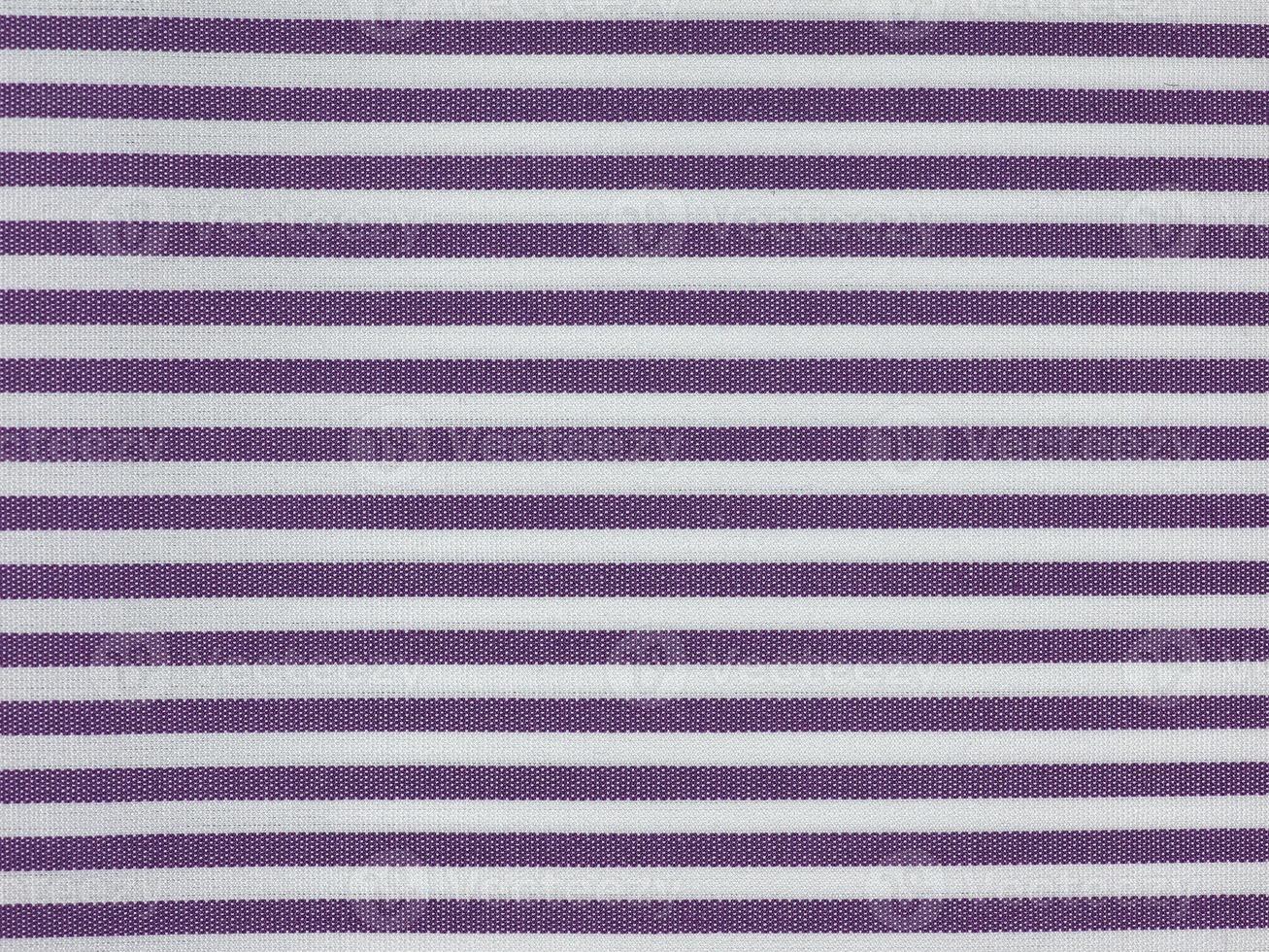Fondo de textura de tela a rayas violetas foto