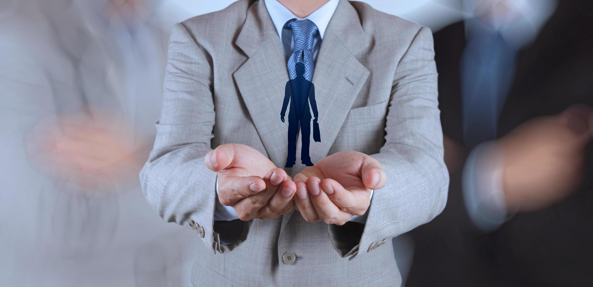 businessman hand choosing people icon as human resources concept photo