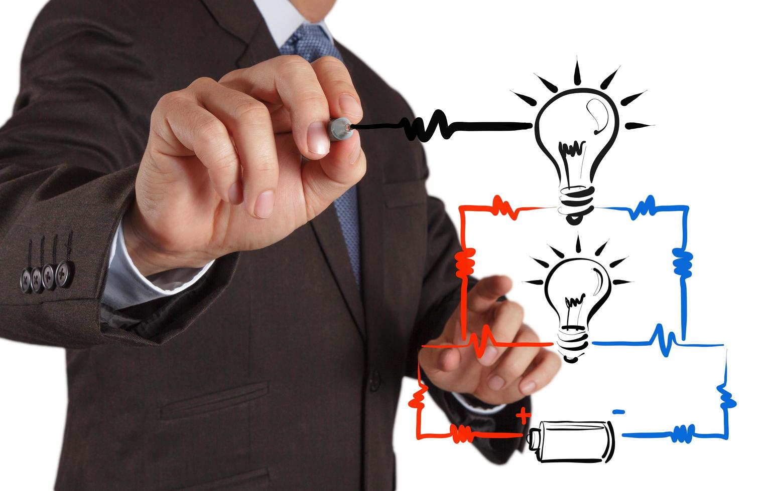 businessman hand draws electrical diagram photo