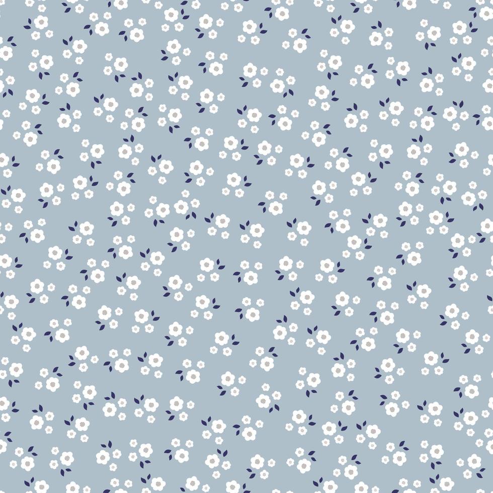 Beautiful seamless patterns Small and large floral background placed randomly distributed on a blue background. The design used for fabric, textile, publication, gift wrapping, vector illustration.