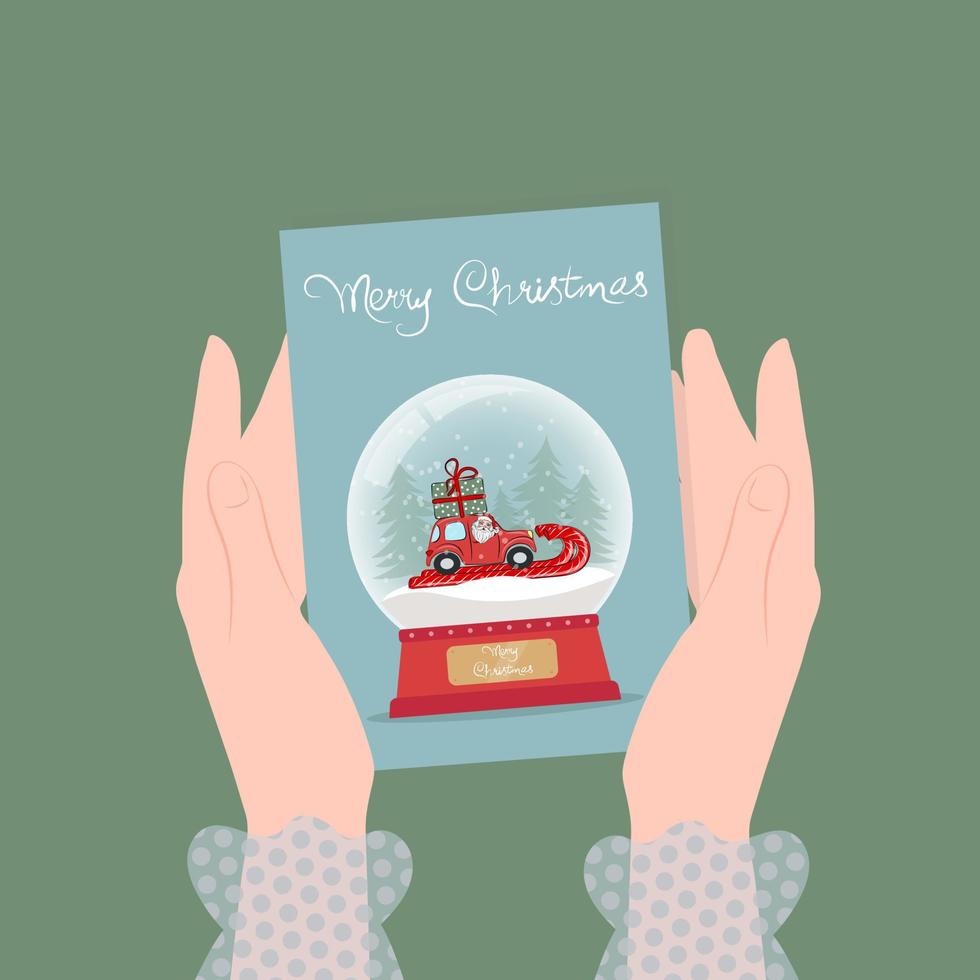 Christmas illustration, female hands are holding a greeting card with a snowy glass ball and the inscription Merry Christmas. vector