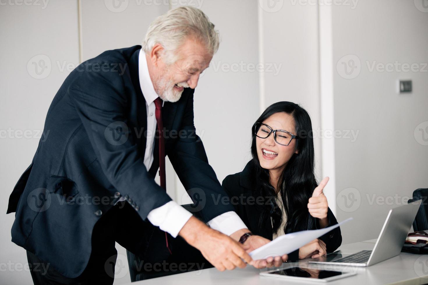 businessmen holding documents for business partners discussing  and share ideas at meeting and business women smiling happy for working photo