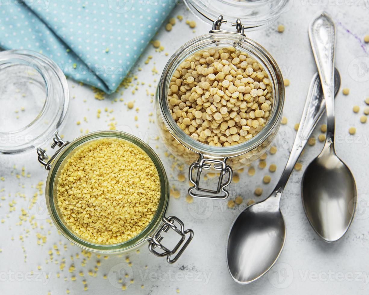 Raw Couscous on a table photo