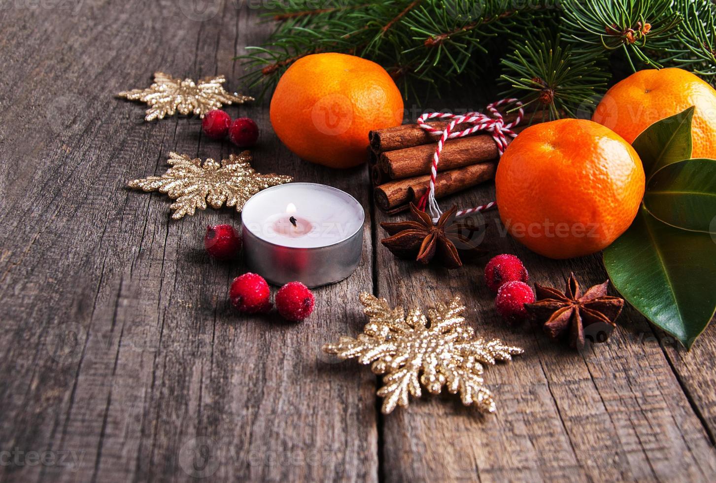 Christmas tangerines and decorations photo