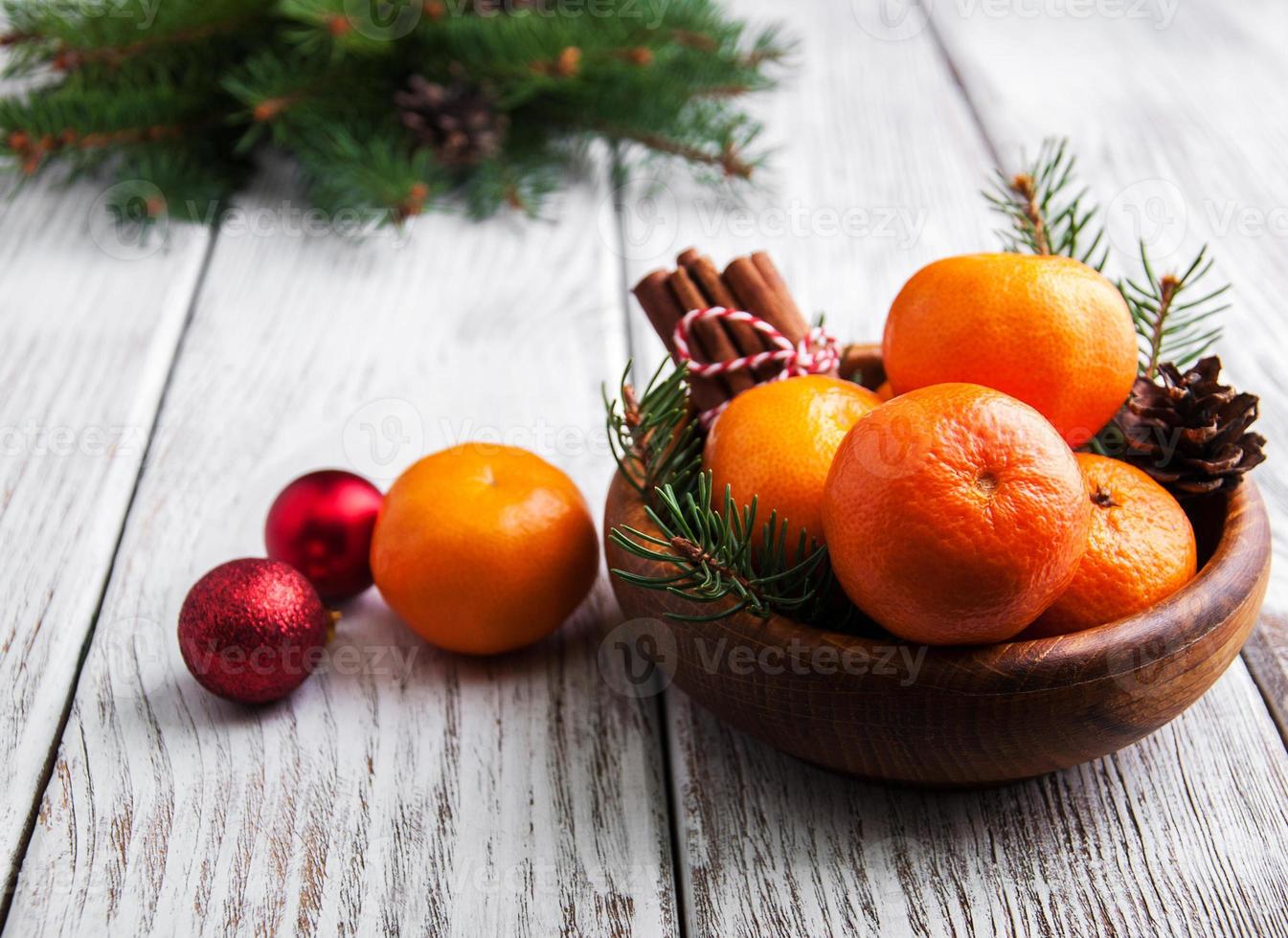 Christmas composition with tangerines photo