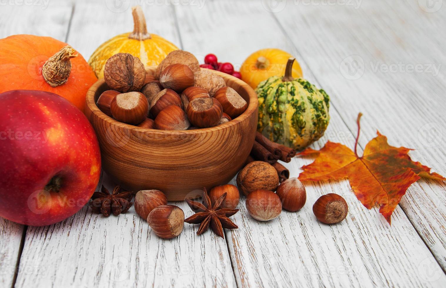 Hazelnuts and pumpkins photo