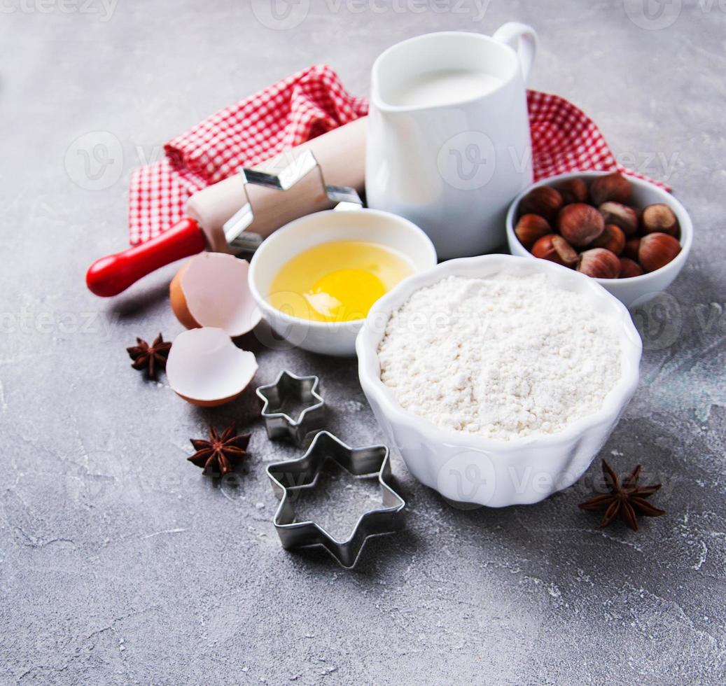 Kitchen table with baking ingredients photo