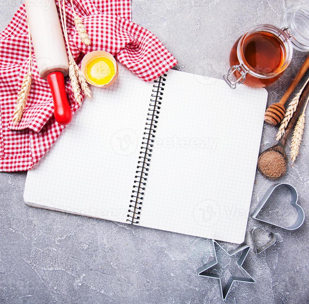 Recipe concept - notebook and ingredients photo