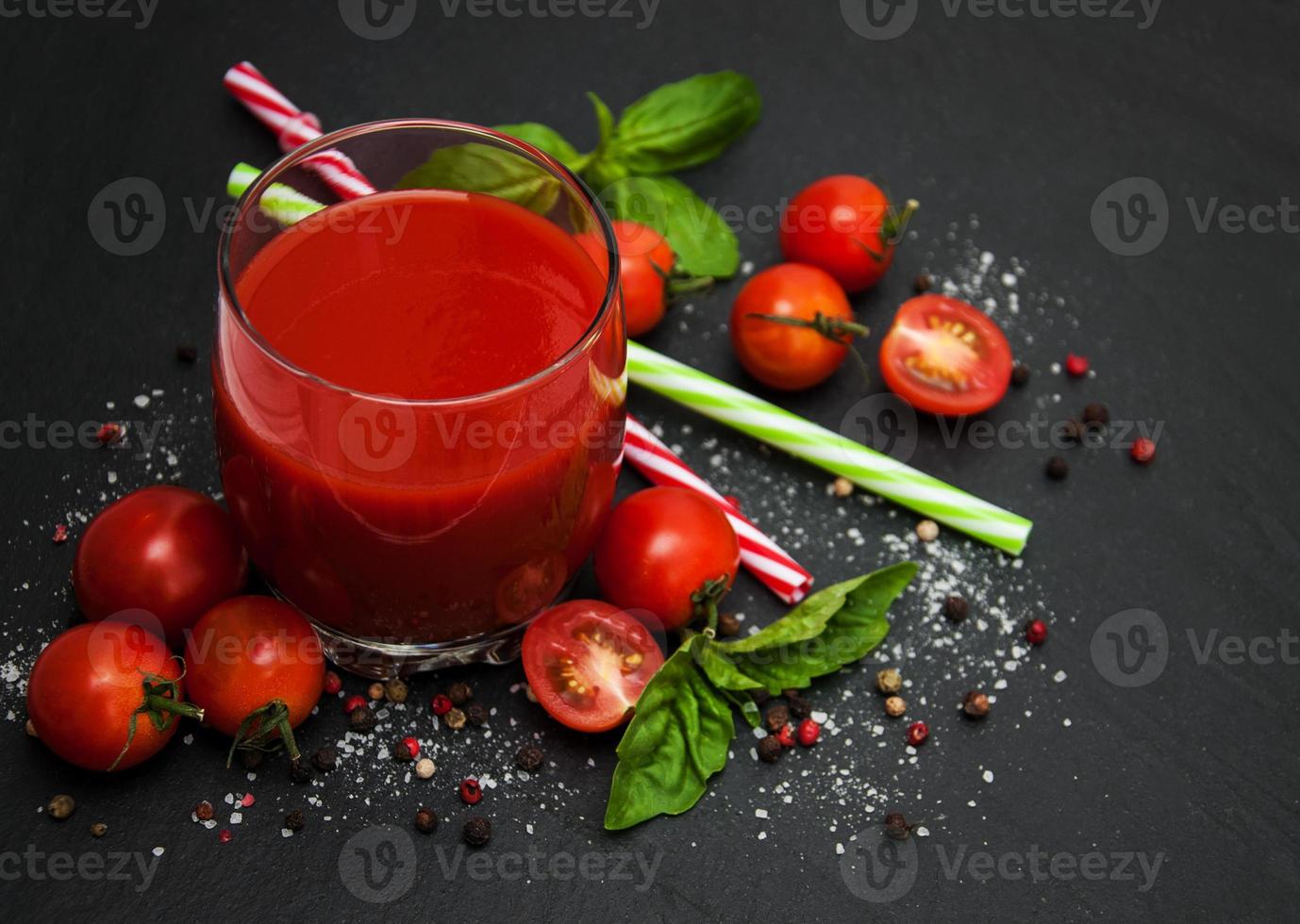 Glass with tomato juice photo