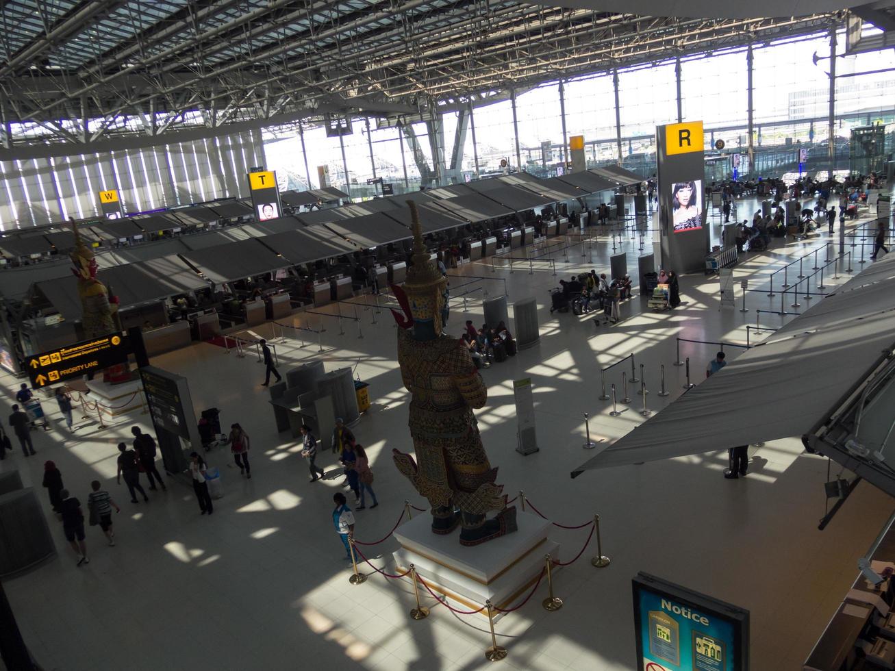 Suvarnabhumi BANGKOK THAILAND31 OCTOBER 2018In the airport passengers are walking to different areas of the airport. Suvarnabhumi Airport is Thailands main airport.0n BANGKOK THAILAND. photo