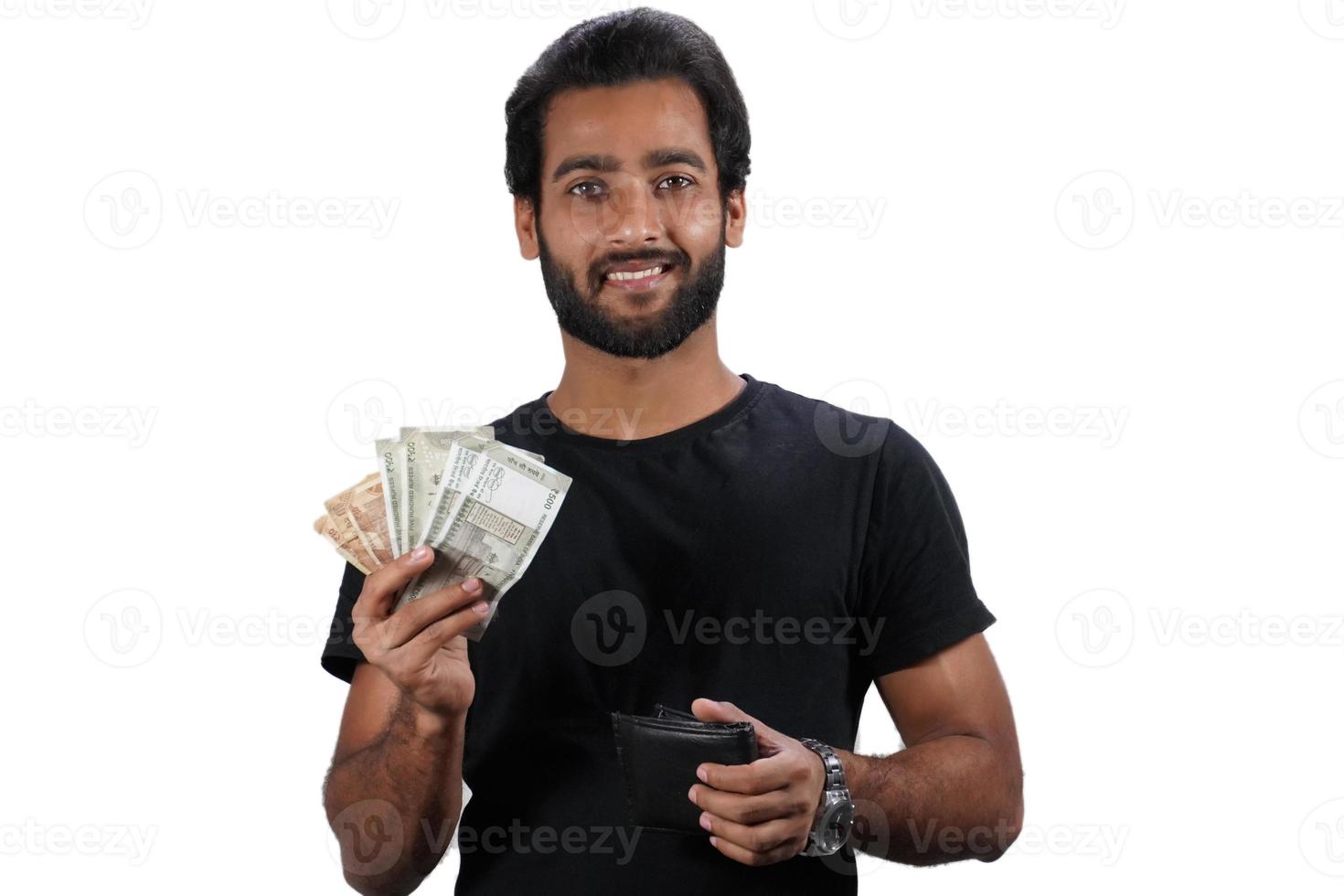 A indian Young man with cash - Money Concept , in white background photo