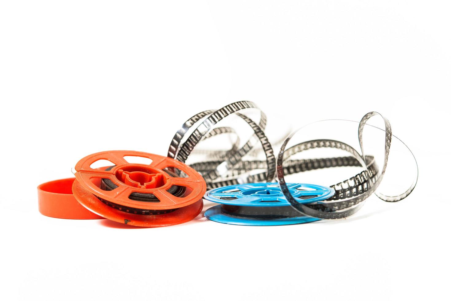 Super 8 film in two colored bobbins photo