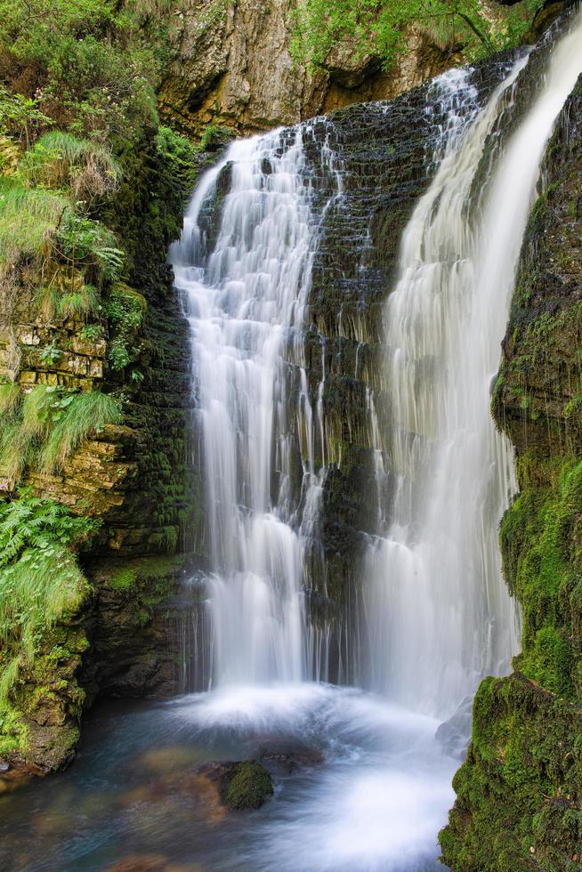 First waterfall of the Enna river springs. Val Taleggio photo