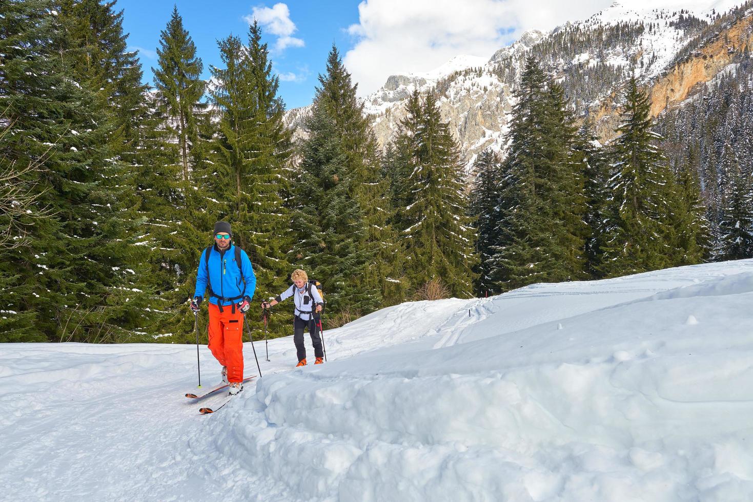 Alpine skiing with alpine guide instructor photo