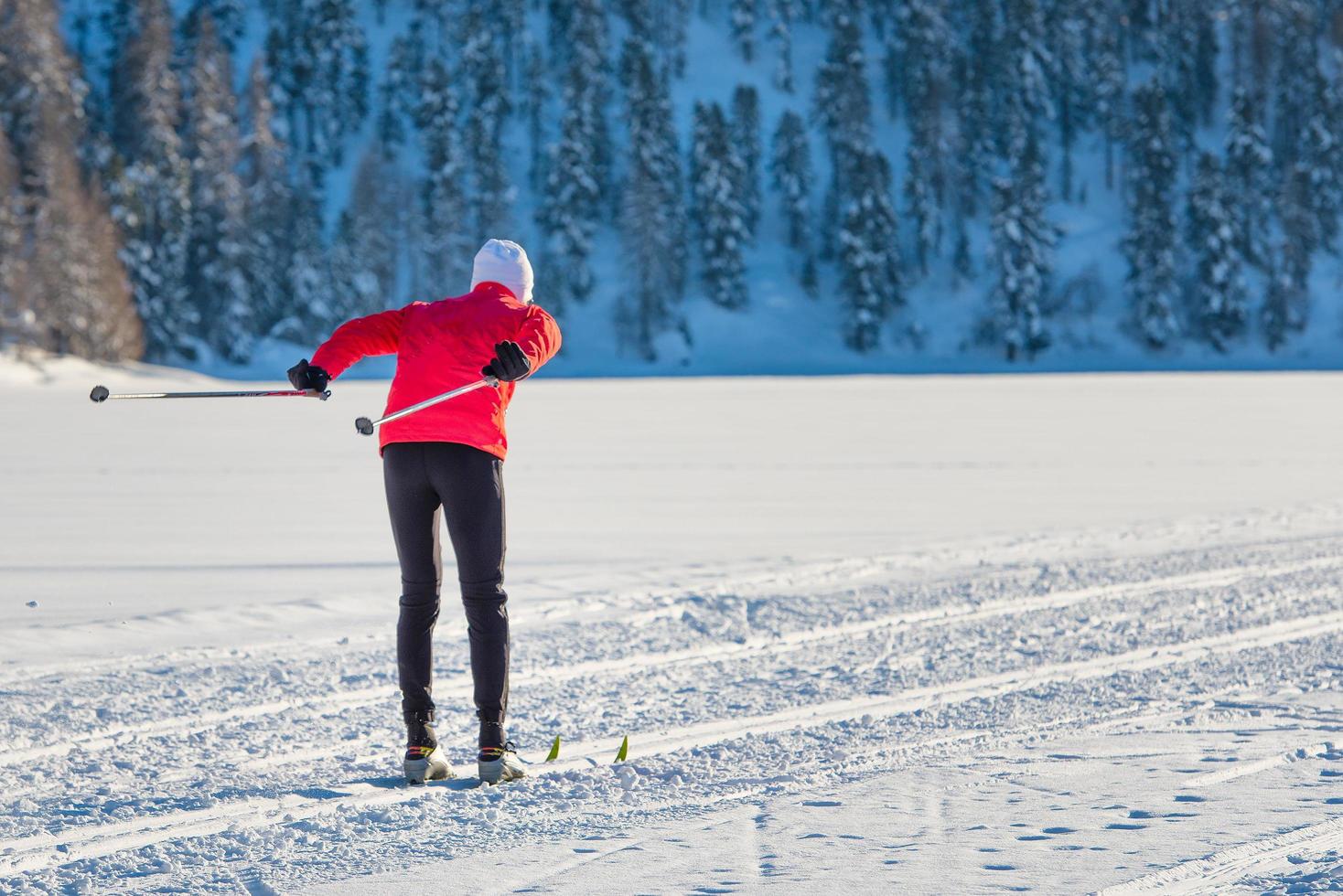 Cross-country skier on track pushes shoe photo