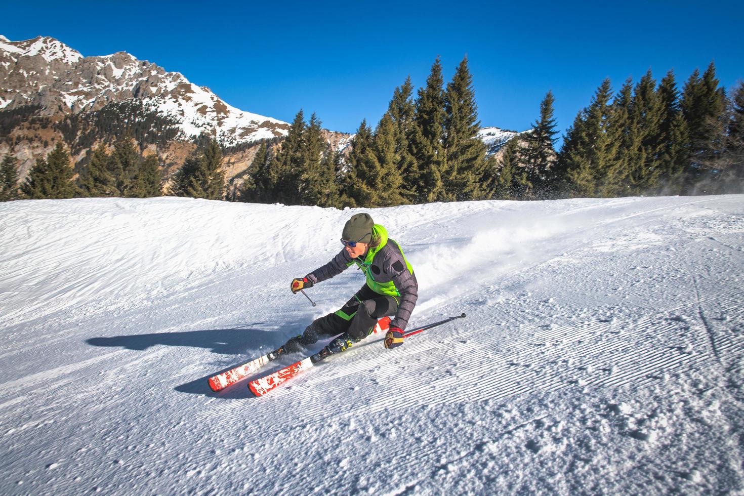 Action on skis of a good skier girl photo