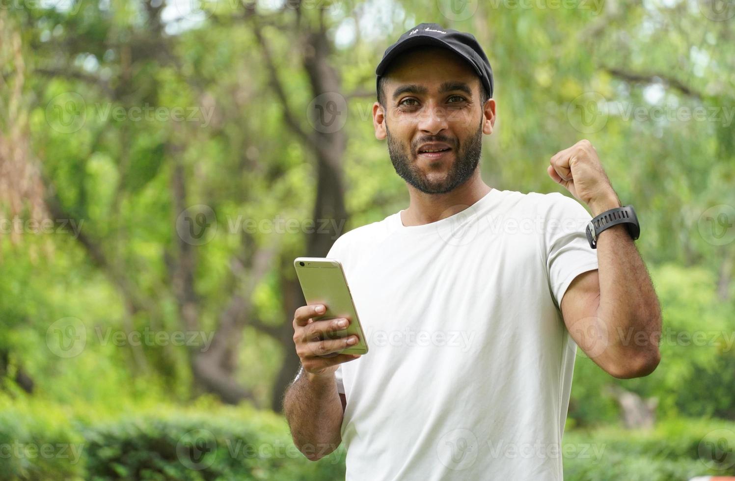 man got good news in his mobile photo