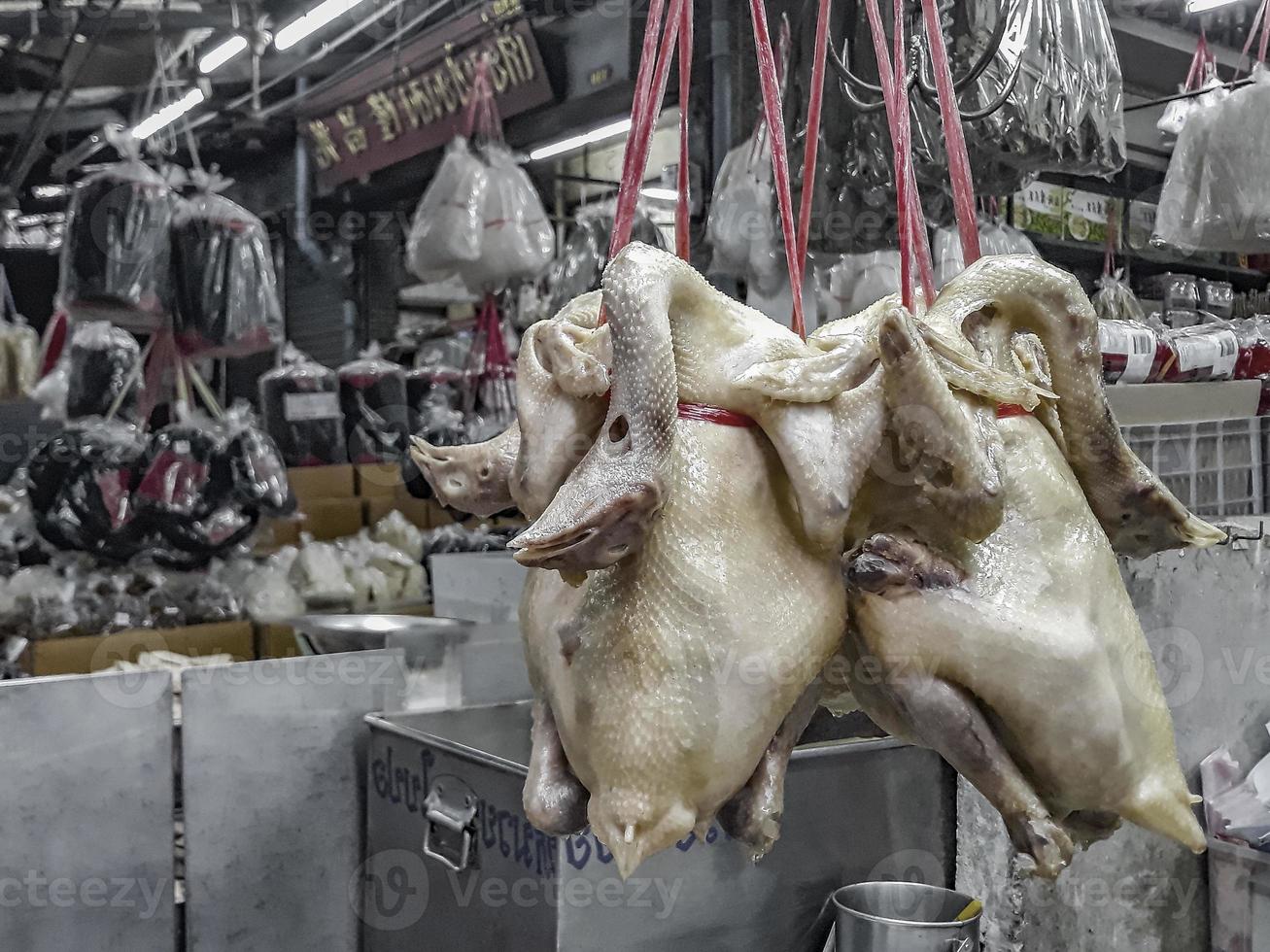 Disgusting Thai Chinese street food market China Town Bangkok Thailand. photo