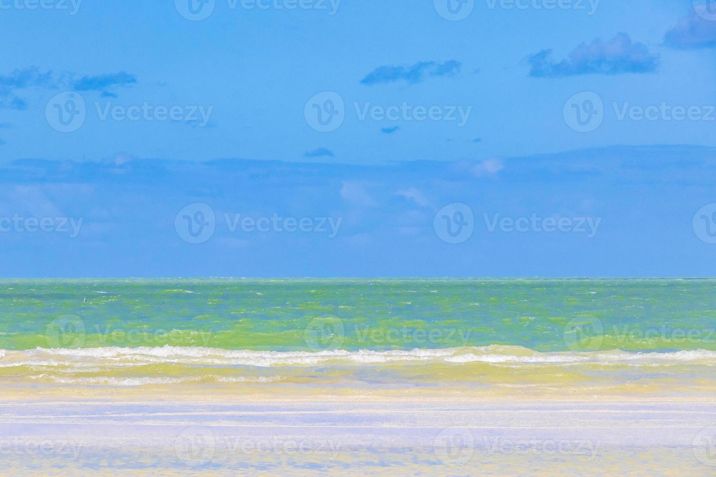 Natural Holbox island beach sandbank panorama turquoise water waves Mexico. photo