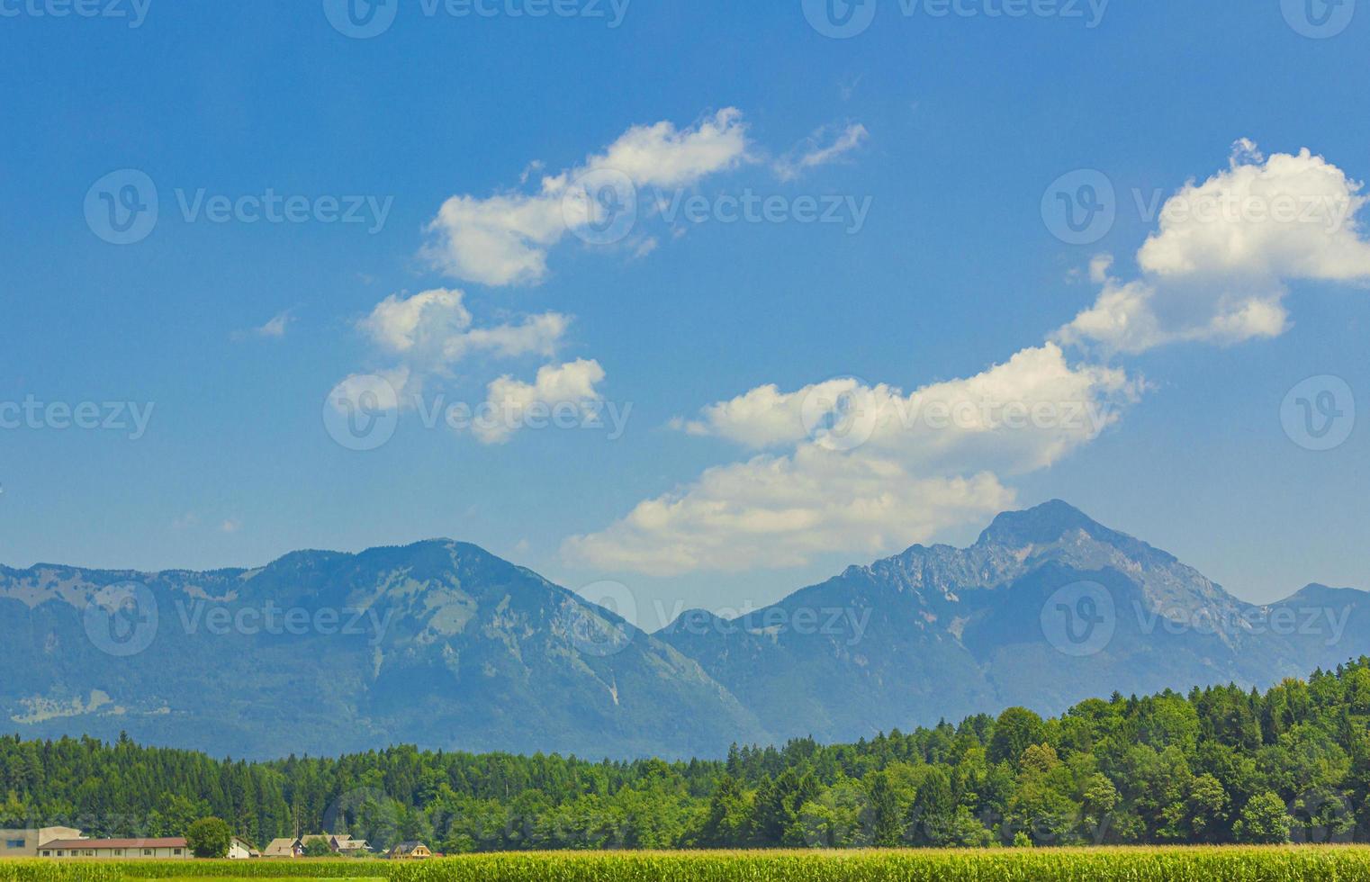 Wonderful mountain and forest landscape with idyllic village in Slovenia. photo