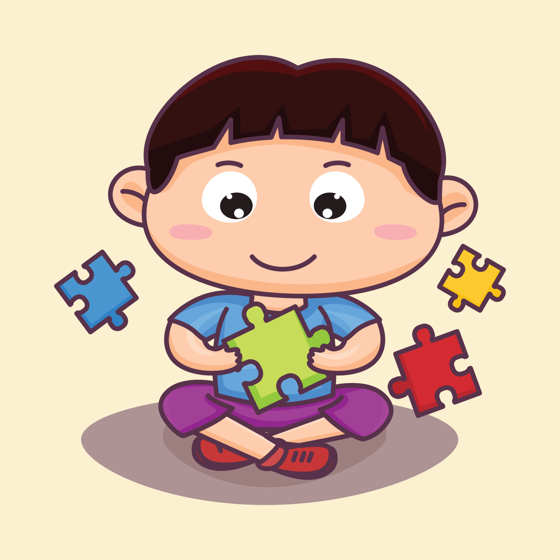 Cute little boy playing jigsaw puzzle. Sit playing. holding a colorful