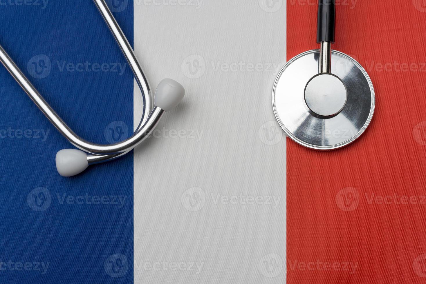 French flag and stethoscope. The concept of medicine. photo