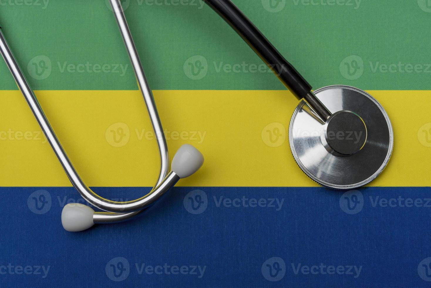 Gabon flag and stethoscope. The concept of medicine. photo