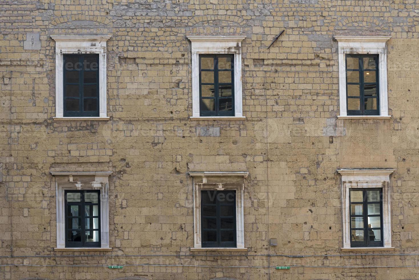 Windows of houses of old houses of Rome in Italy. photo