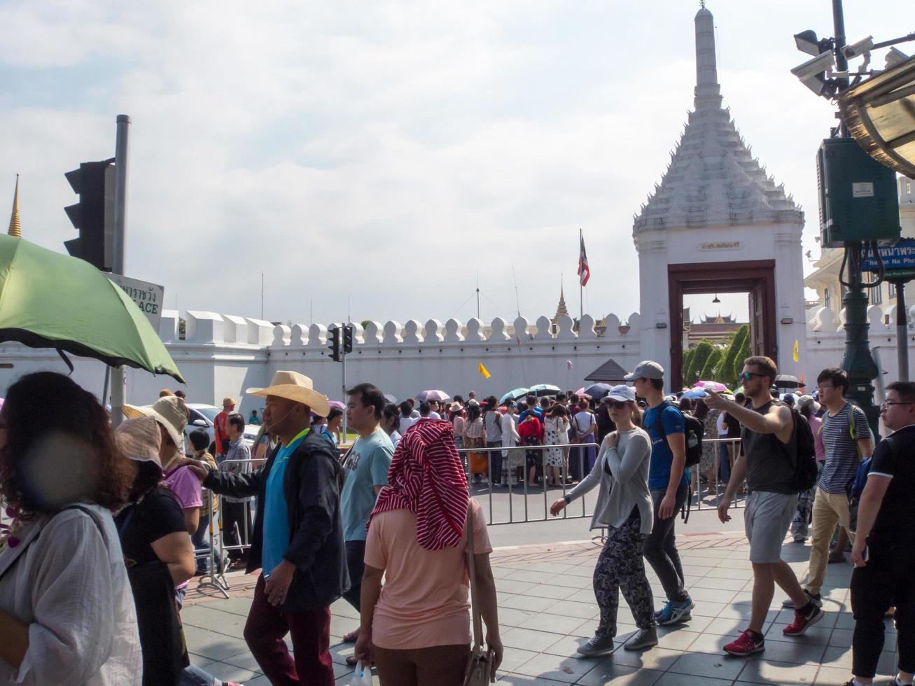 Wat Phra Kaew Temple of the Emerald Buddha BANGKOK THAILAND31 DECEMBER 2018Many tourists in front of the Grand Palace on the last day of the year 2018 traveling in Bangkok Thailand. photo