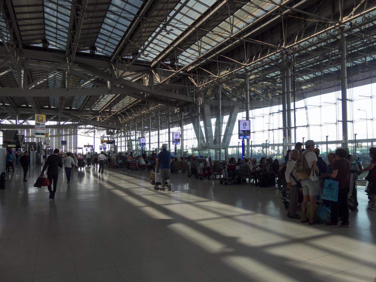 Suvarnabhumi BANGKOK THAILAND31 OCTOBER 2018In the airport passengers are walking to different areas of the airport. Suvarnabhumi Airport is Thailands main airport.0n BANGKOK THAILAND. photo