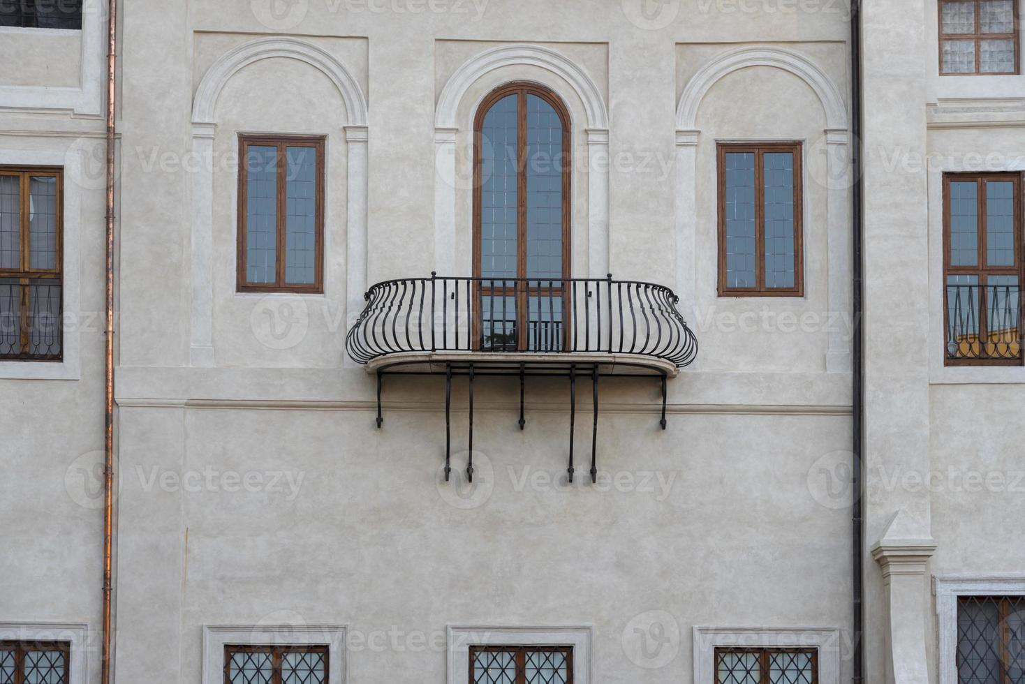 Windows of houses of old houses of Rome in Italy. photo