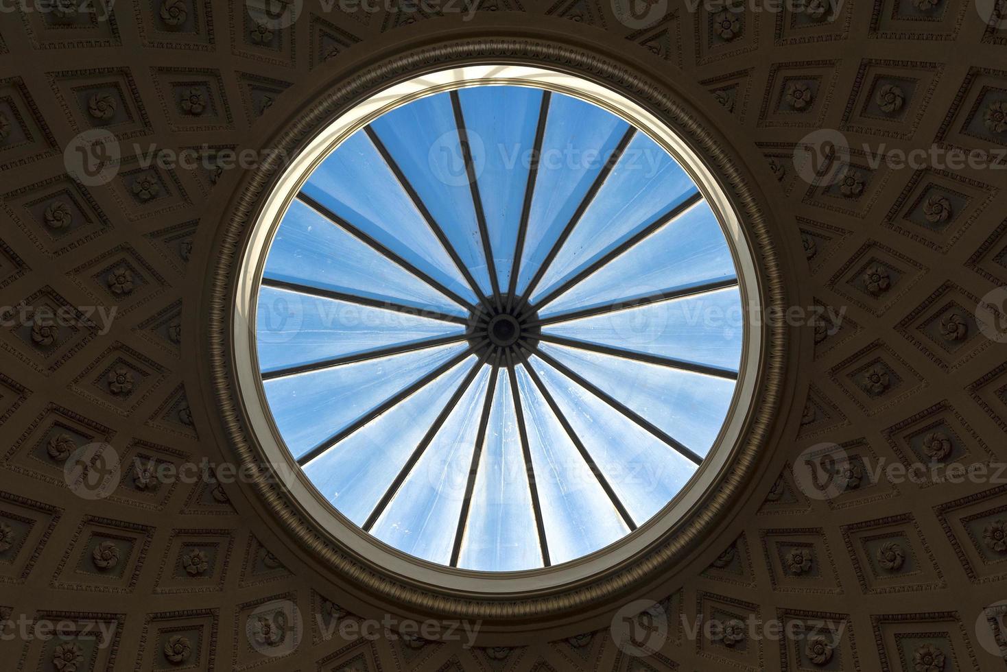 The round window in the ceiling of the Vatican. photo