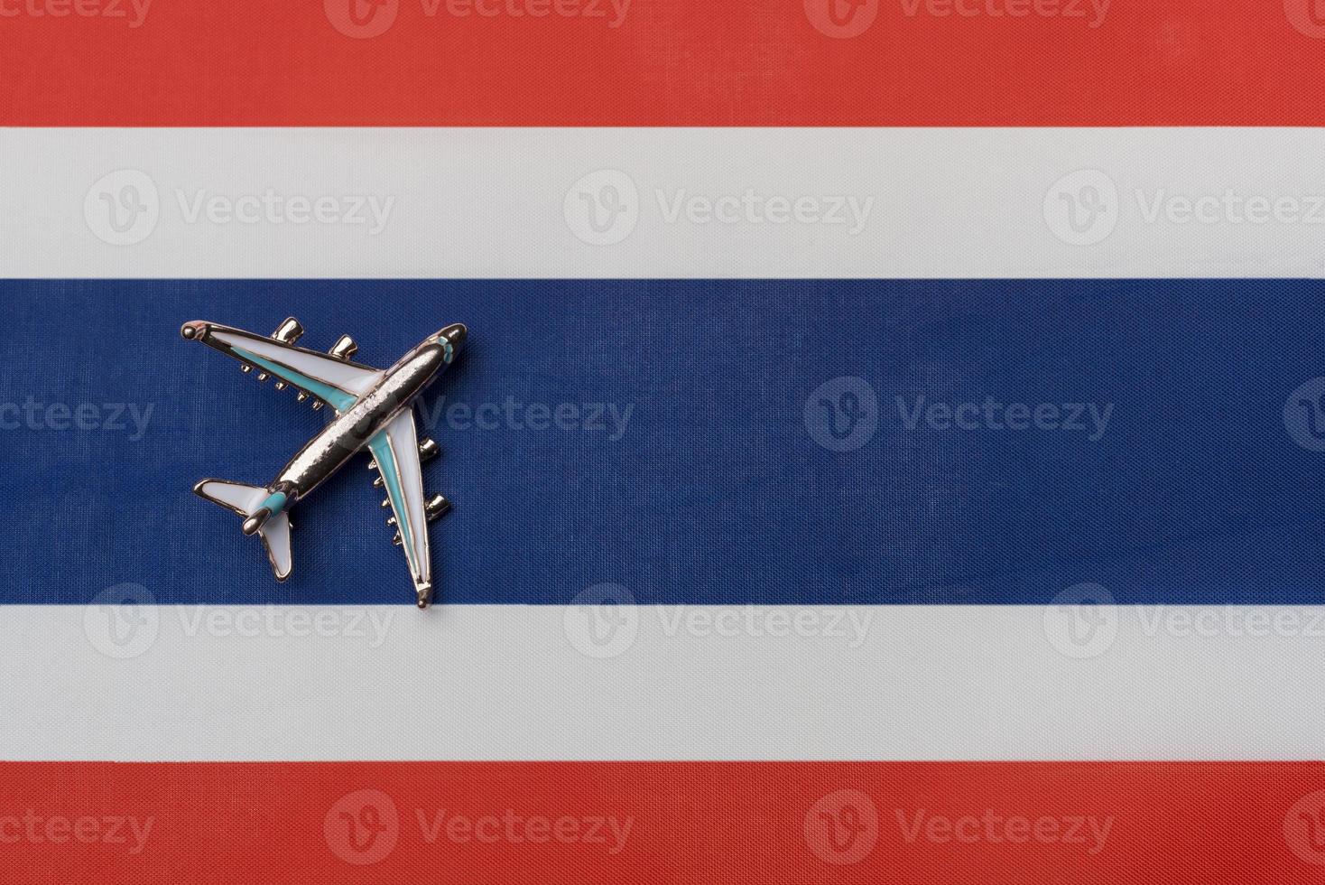 The plane over the flag of Costa Rica, the concept of travel. photo