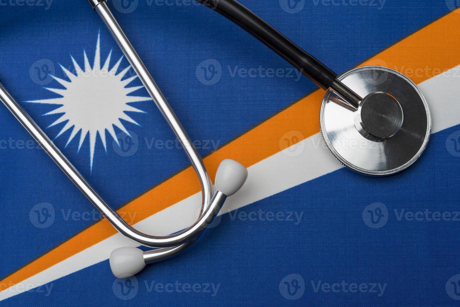 Marshall Islands flag and stethoscope. The concept of medicine. photo