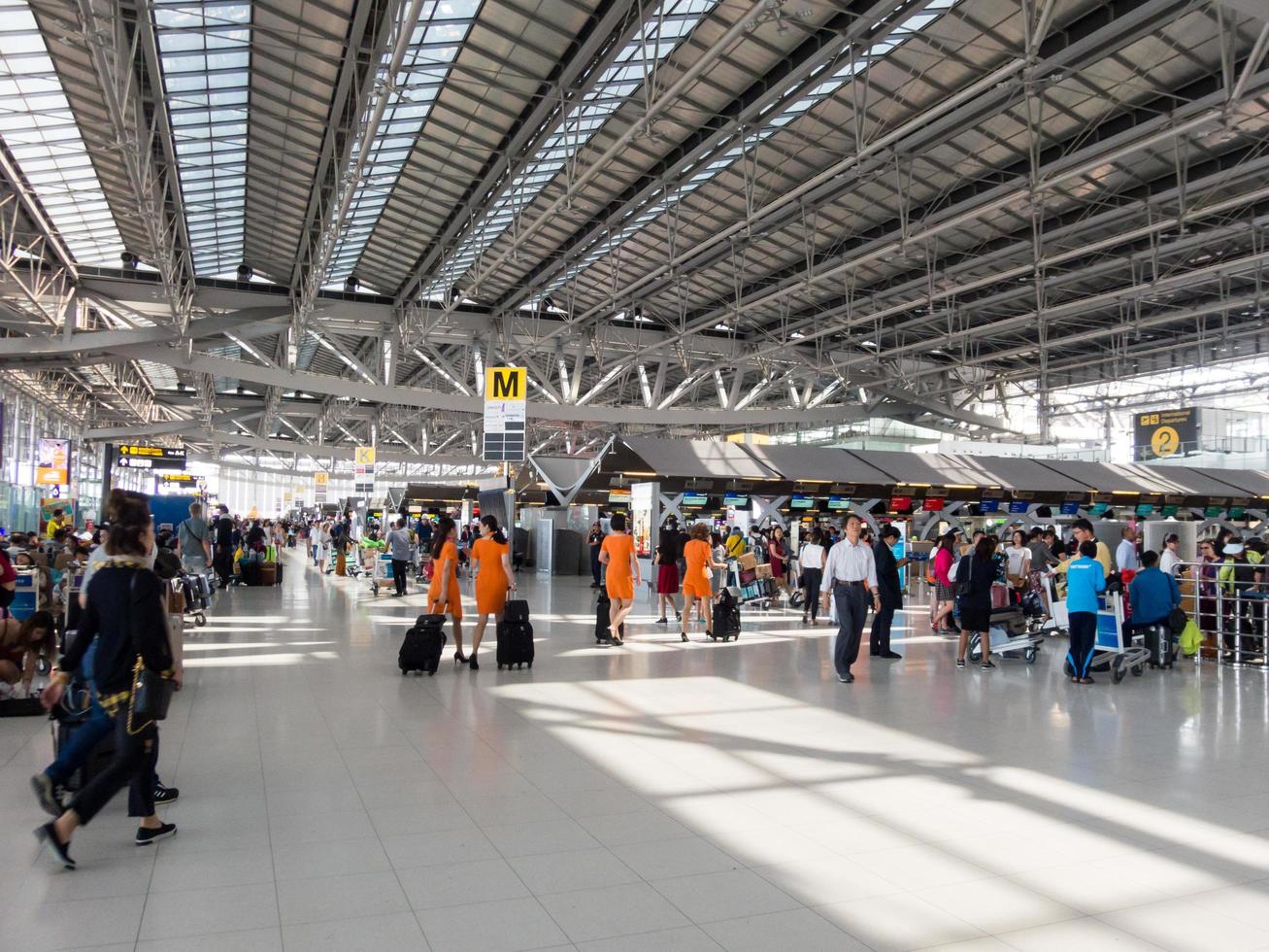 Suvarnabhumi BANGKOK THAILAND31 OCTOBER 2018In the airport passengers are walking to different areas of the airport. Suvarnabhumi Airport is Thailands main airport.0n BANGKOK THAILAND. photo