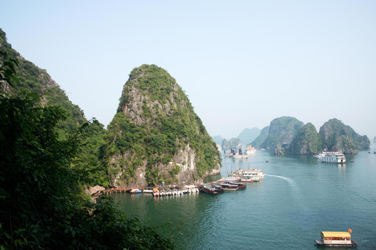 Beautiful aerial view of Halong bay. Touristic boats, sunny day, calm water. Vietnam photo