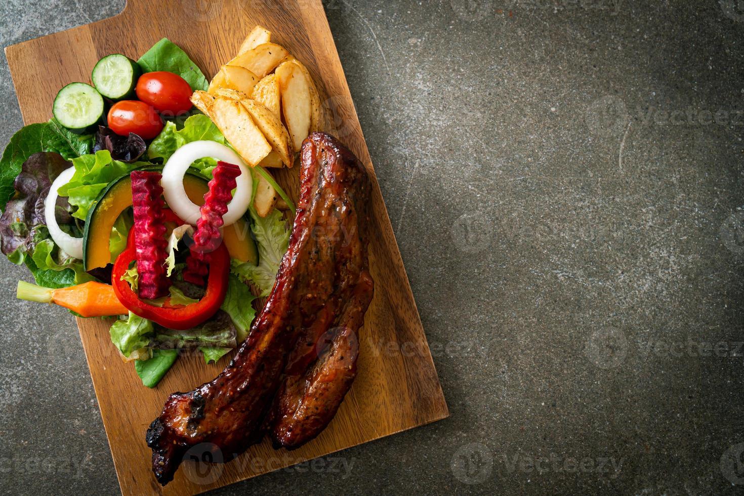 barbecue pork spare ribs with vegetables photo