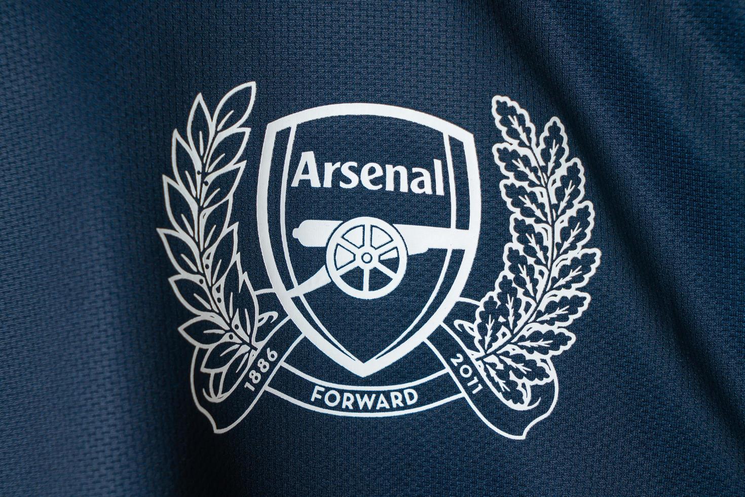 Bangkok, Thailand - Jan 18, 2022 - Arsenal logo on Arsenal retro shirt home jersey season 2008-2010 photo