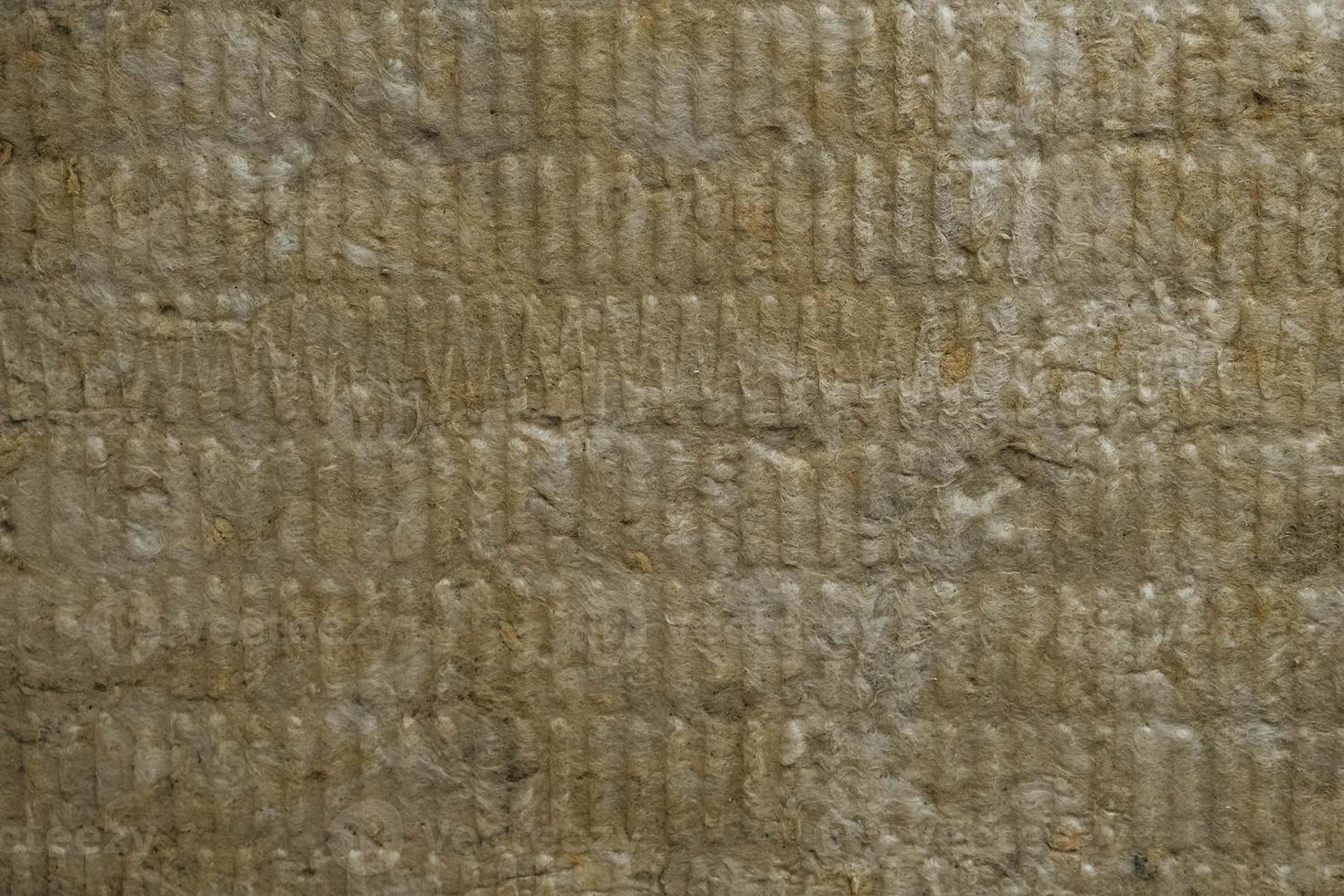 Mineral wool for insulating the walls as a background image texture. Top view. Copy, empty space for text photo