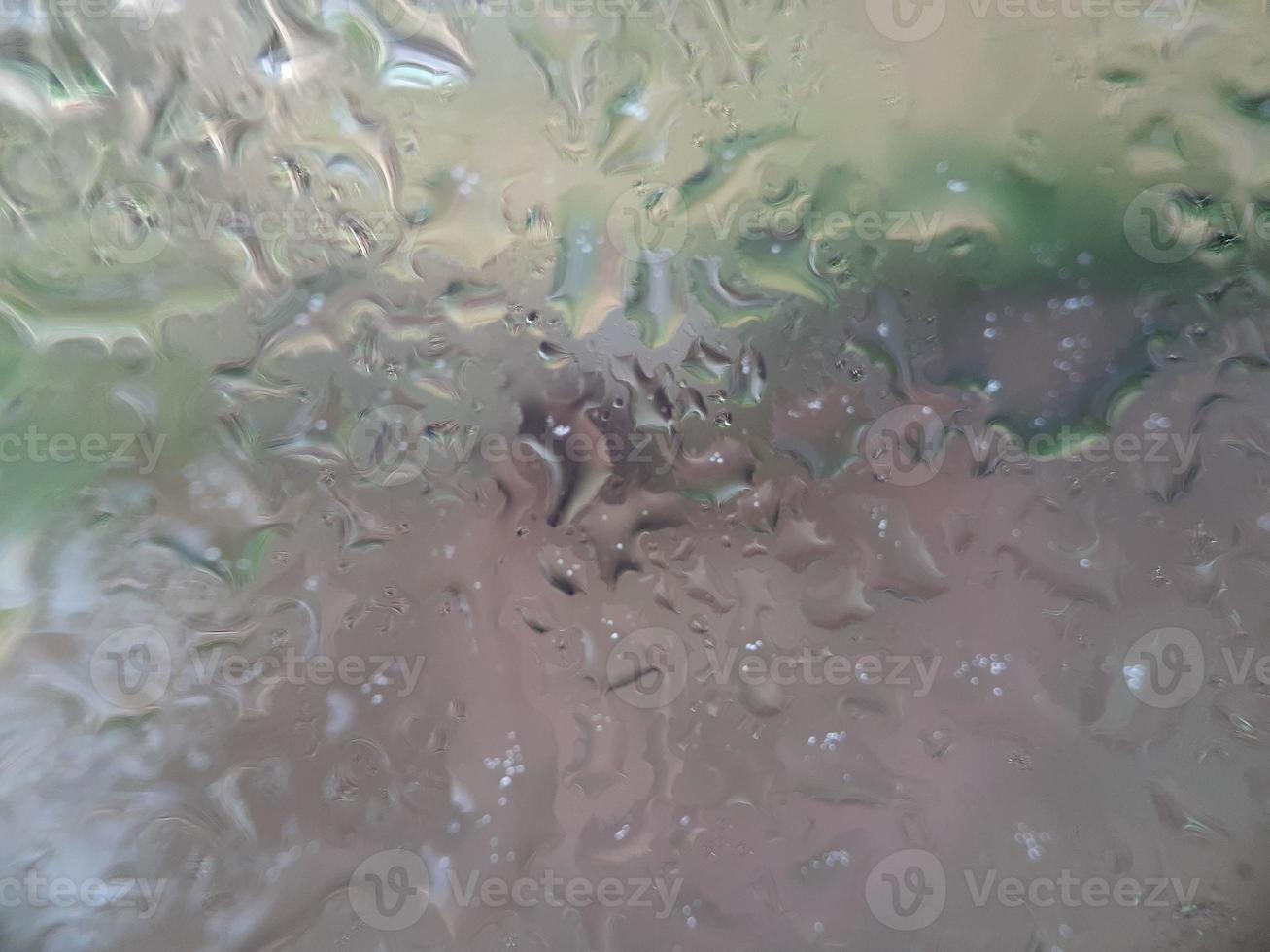 Water splash on clear glass photo