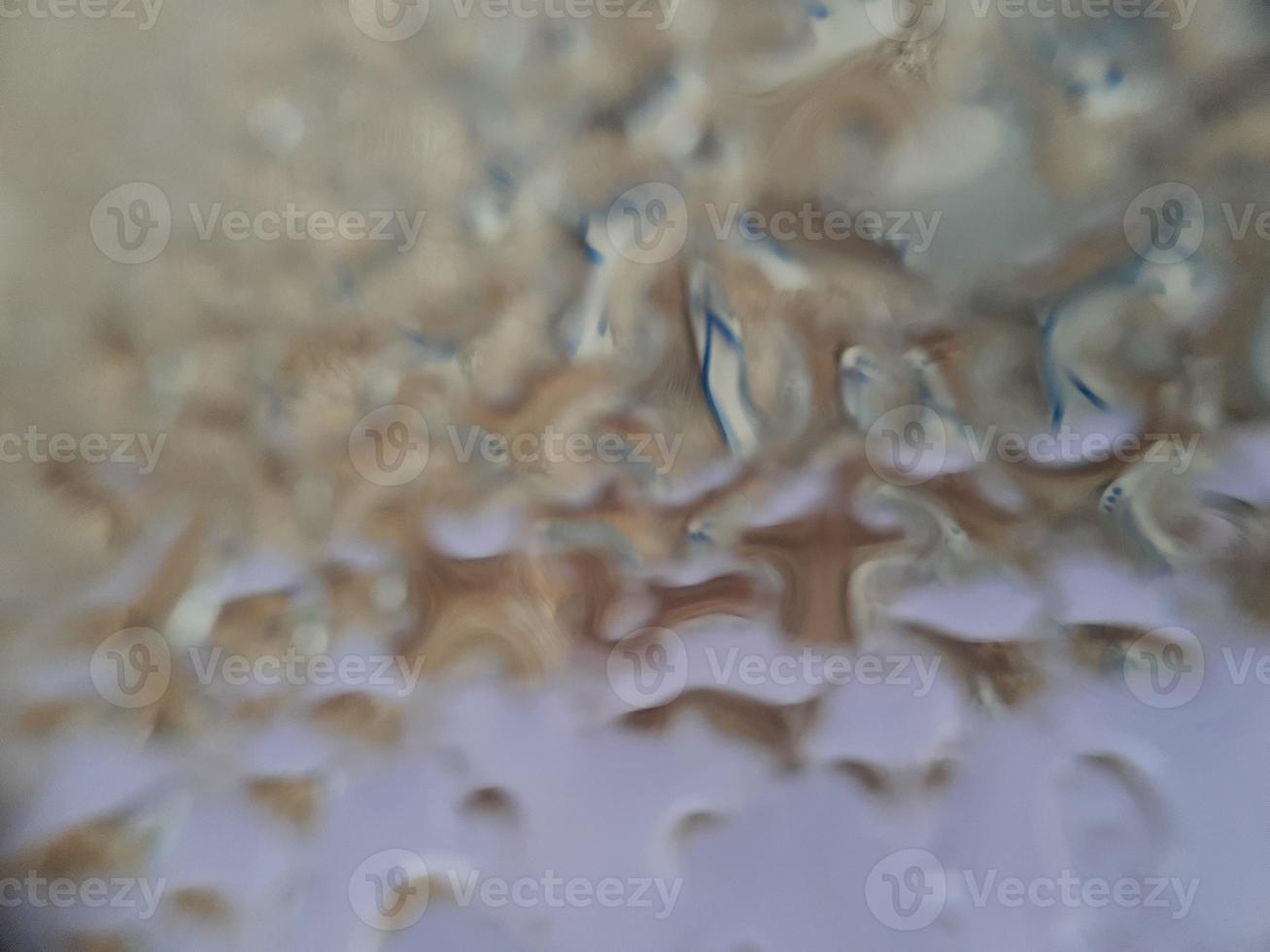 Water splash on clear glass photo