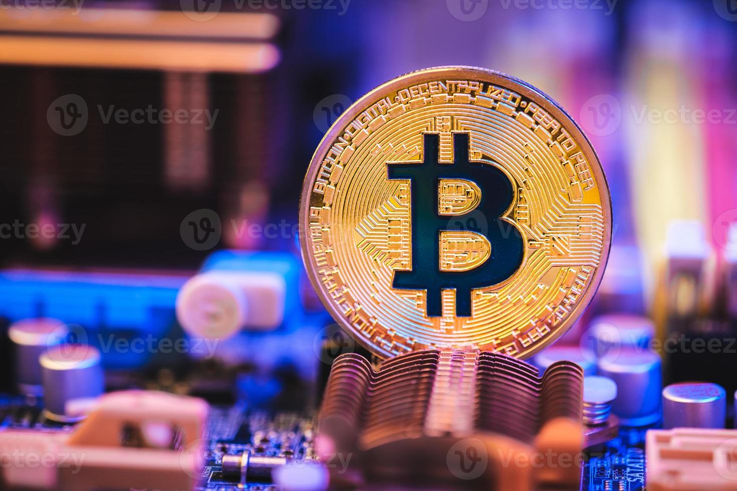 Bitcoin crypto currency on circuit board .virtual money.blockchain technology.mining concept photo