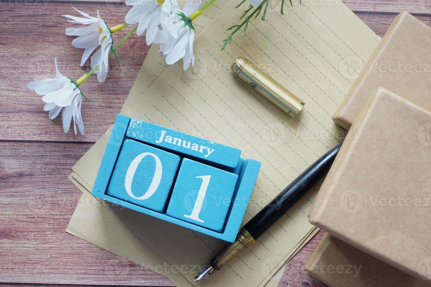 wooden calendar set on 1st of january photo