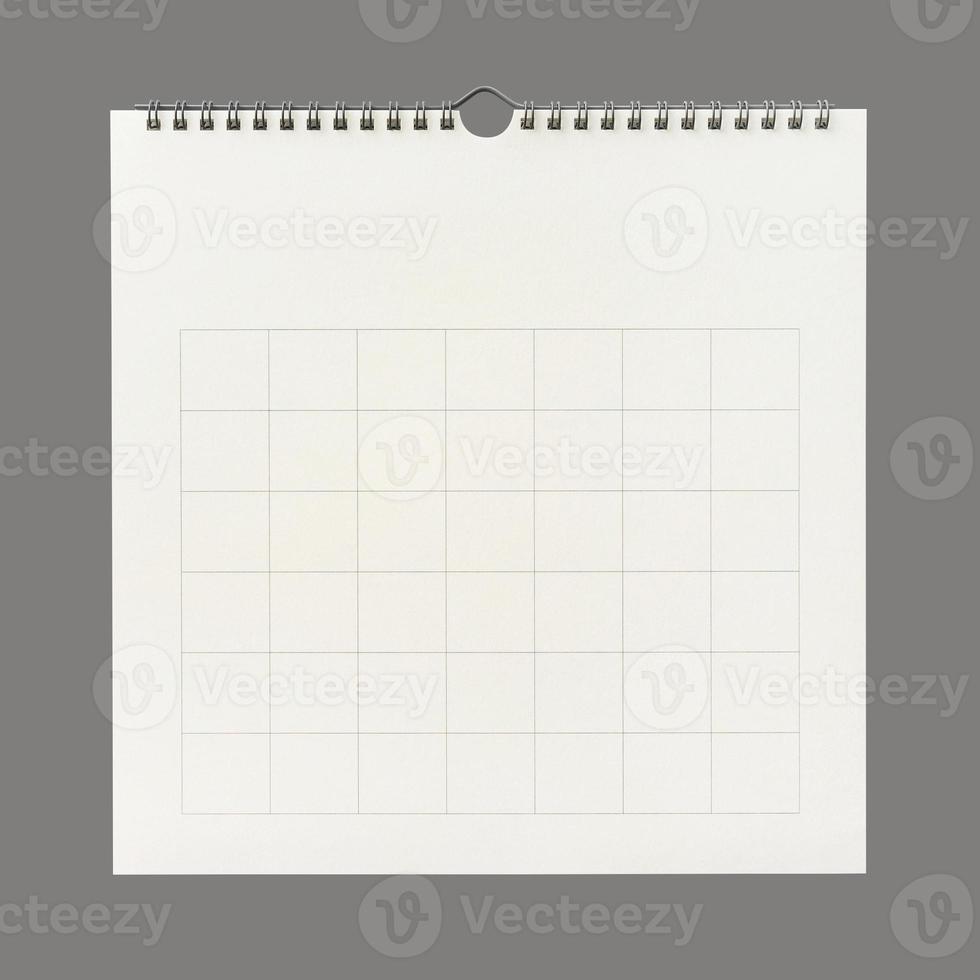 White calendar paper background with grid line of table. Wall calendar on gray background. photo