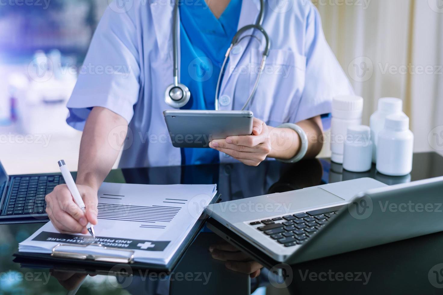 Healthcare business graph and Medical examination and businessman analyzing data and growth chart on laptop photo
