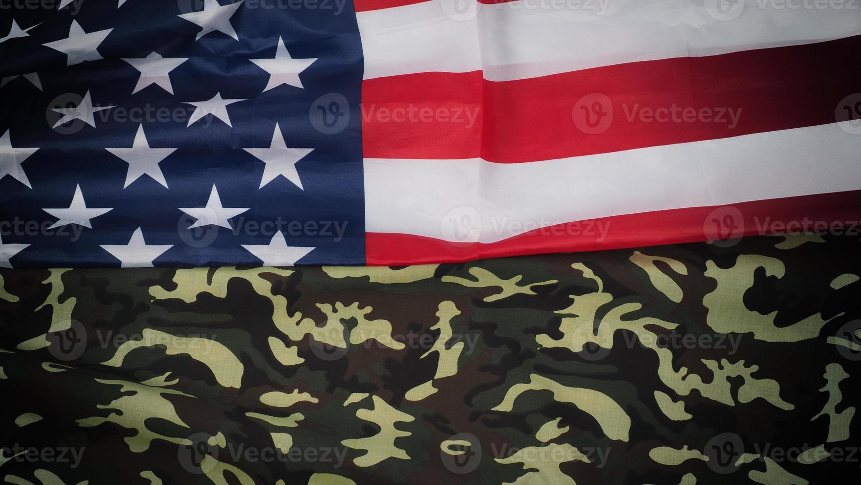 American flag and Military camouflage pattern. Top view angle. photo