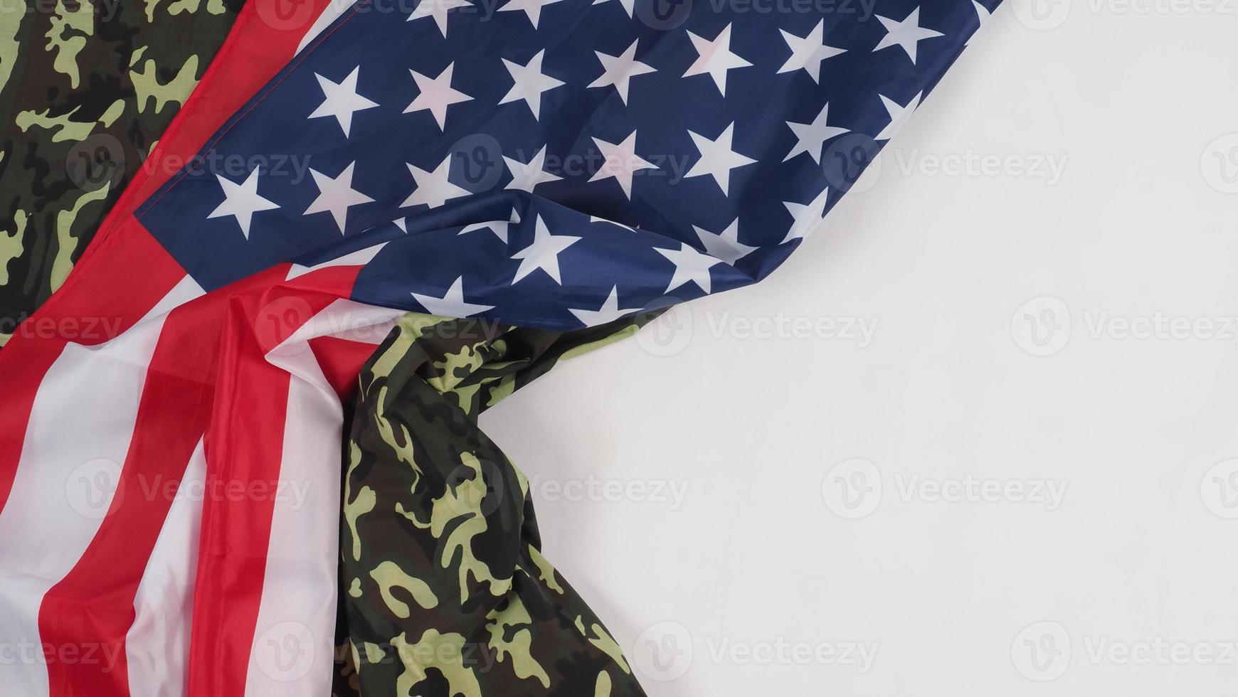 American flag and Military camouflage pattern. Top view angle. photo