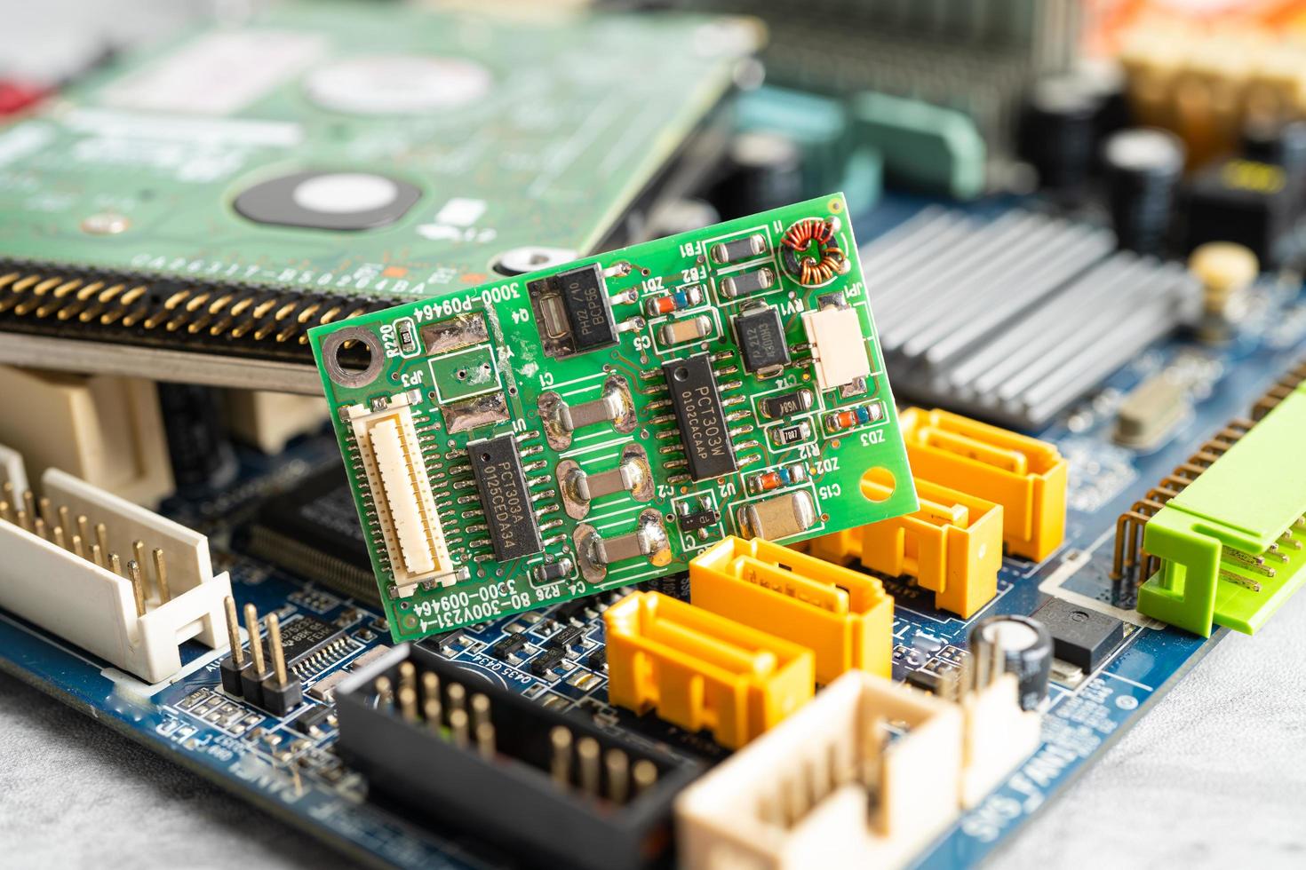micro circuit main board computer electronic technology, hardware, mobile phone, upgrade, cleaning concept. photo
