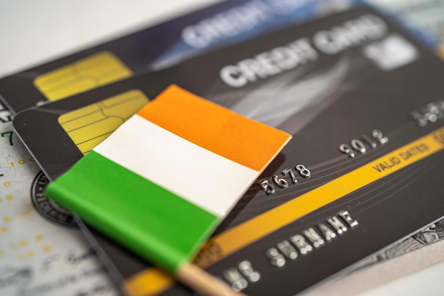 Ireland flag on credit card. Finance development, Banking Account, Statistics, Investment Analytic research data economy, Stock exchange trading, Business company concept. photo