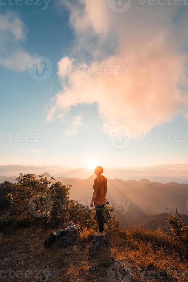 Hiking in mountains in the evening photo